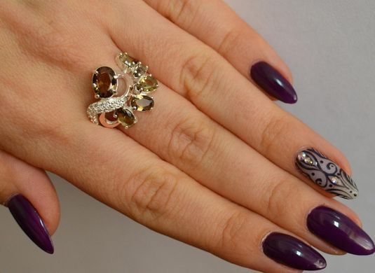 Серебряное кольцо с золотыми вставками 153к 21