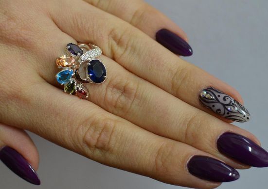 Серебряное кольцо с золотыми вставками 153к 21