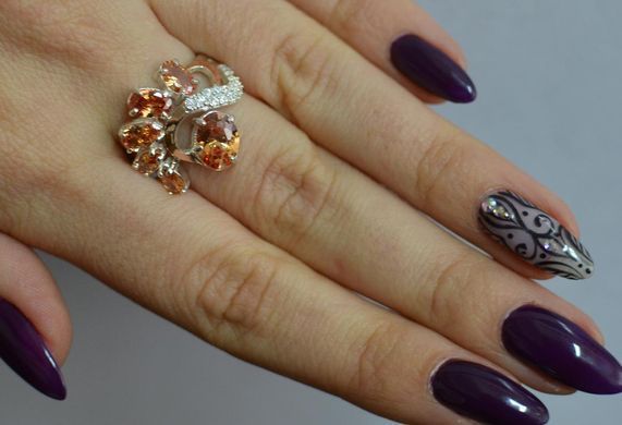 Серебряное кольцо с золотыми вставками 153к 21